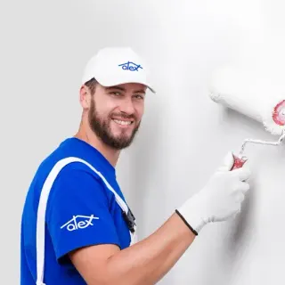 Alex wallpapering and painting